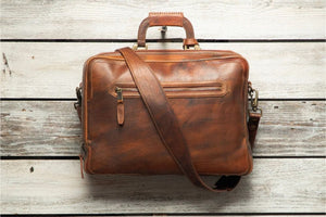 Brown bag on wooden table