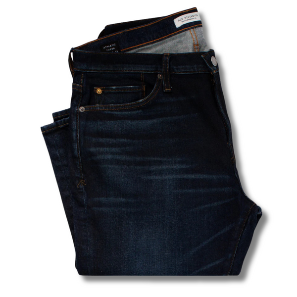 Close-up of the denim texture and stitching details on the Ace Rivington Athletic Taper Jeans in Asphalt