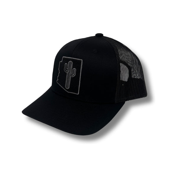 Front view of Local Stated BA Cactus Stated Hat in Black/Black featuring a tonal black cactus logo patch on a structured crown with a curved brim
