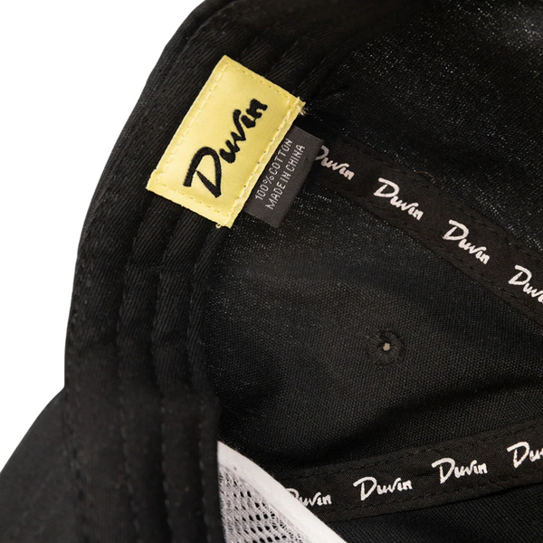 Black Beach Club Hat laid flat to show front embroidery and structured design