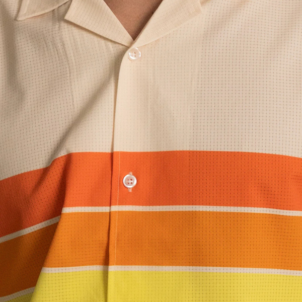 Close-up of stretch fabric texture, button placket, and soft stripe design on the Duvin Horizon Leisure Stretch Button-Up in Antique