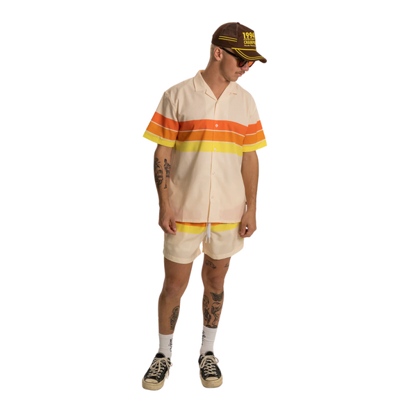 Close-up of horizon stripe print, waistband stitching, and fabric texture on the Duvin Horizon Swim Short in Antique