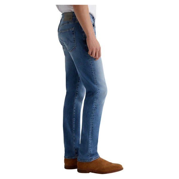 Side view of AG Everett jeans in Prolific showing slim leg profile and mid-rise waist