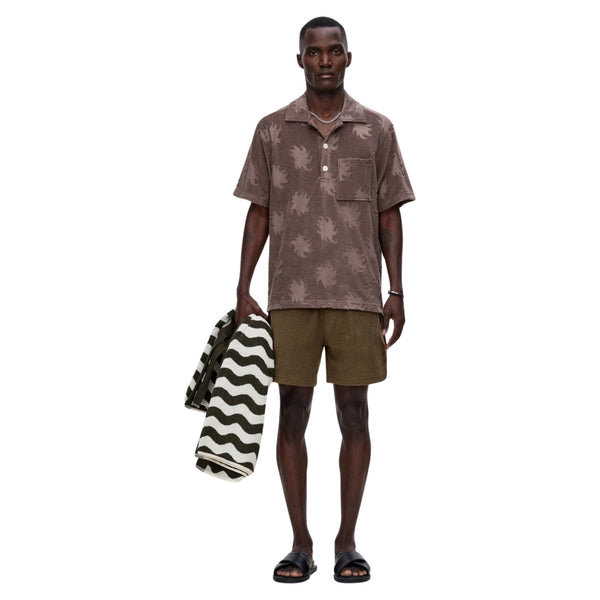 Front view of the OAS Ember Girona Terry Shirt featuring a relaxed fit, short sleeves, and textured terry fabric with a vibrant retro pattern