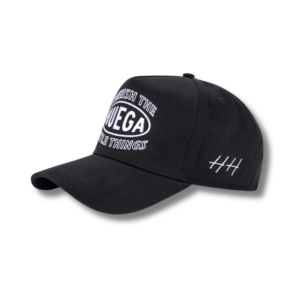 Side view of Huega House Circuit Hat in Black showing sleek mid-profile silhouette, tonal stitching, and clean design lines