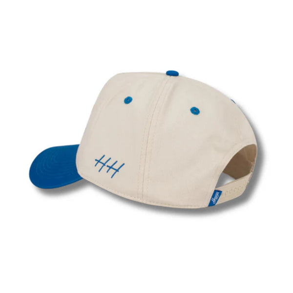 Back view of Huega House Moments Hat in Blue and Natural with adjustable strap closure and clean two-tone paneling