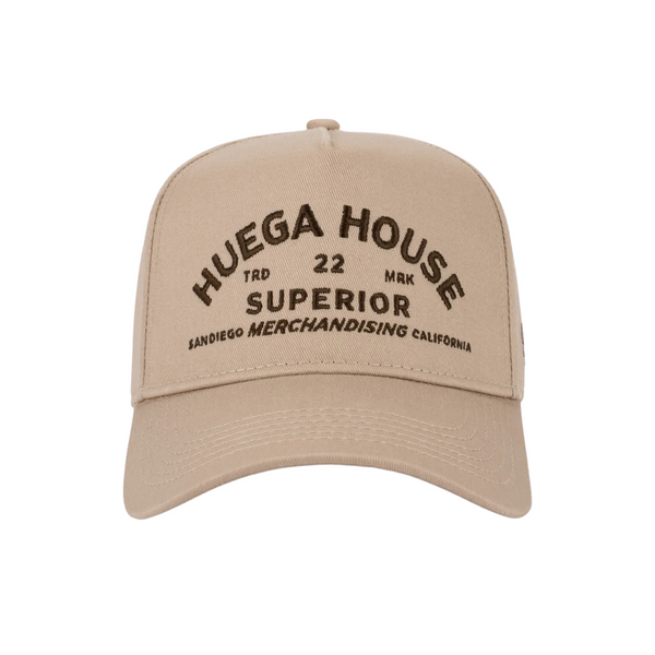 Front view of Huega House Trademark Hat in Khaki featuring the Huega House logo embroidery on a structured crown with a classic curved brim