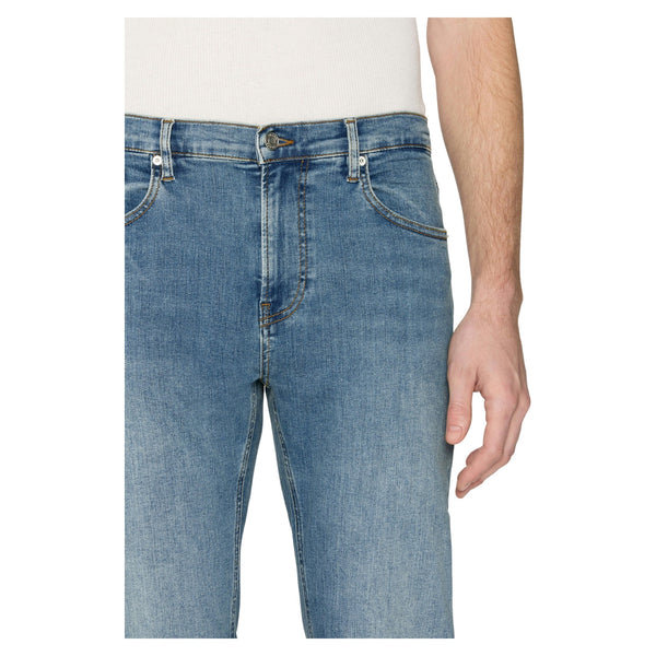 Close-up of fabric grain, waistband details, and distressed wash pattern on the Frame Jetson Modern Straight Jeans in La Mirada