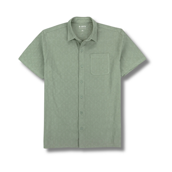 Front view of Jetty Breeze Jacquard Shirt in Sage Green featuring button-up front and textured jacquard pattern