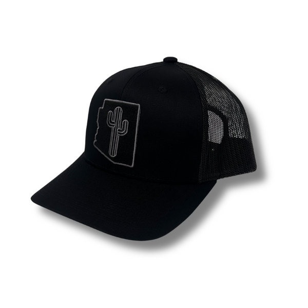 Front view of Local Stated BA Cactus Stated Hat in Black/Black featuring a tonal black cactus logo patch on a structured crown with a curved brim