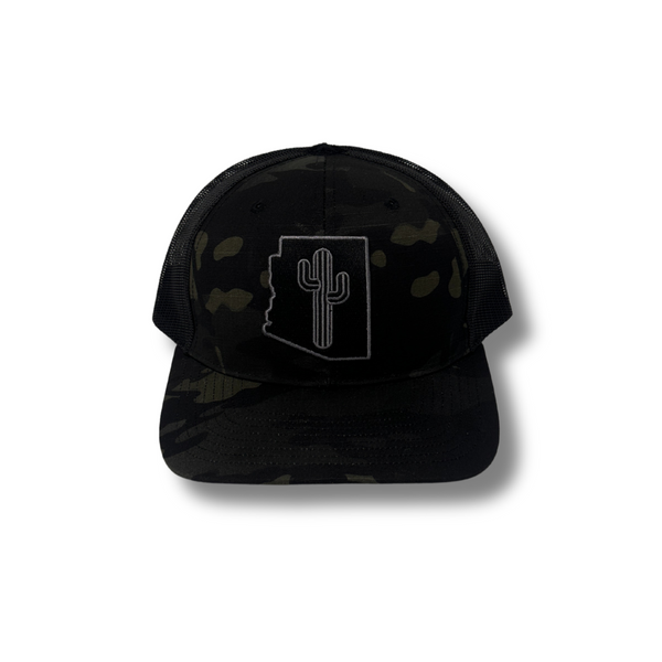 Front view of Local Stated Blacked Out Cactus Stated Hat in Black Camo featuring a tonal embroidered cactus patch on a structured camo crown with a curved brim