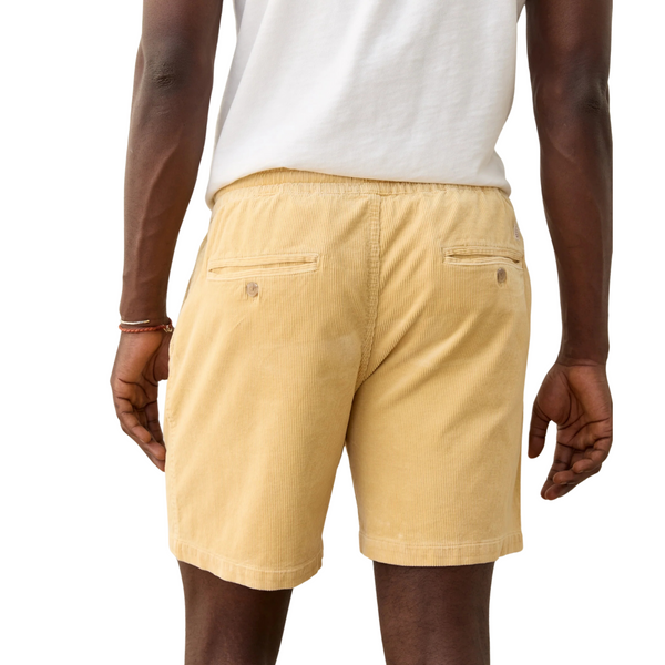 Back view of Marine Layer 6" Corduroy Short in New Wheat with single back pocket and clean stitching