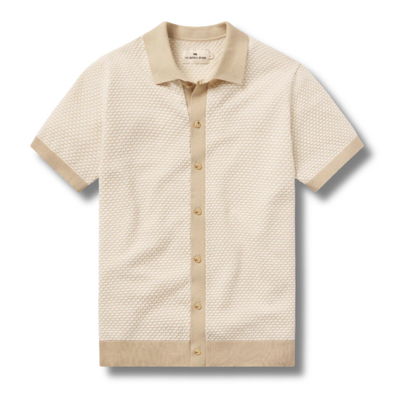 Flat lay of The Normal Brand Robles Knit Jacquard Button-Up in Ivory/Khaki highlighting textured fabric, button front, and camp collar