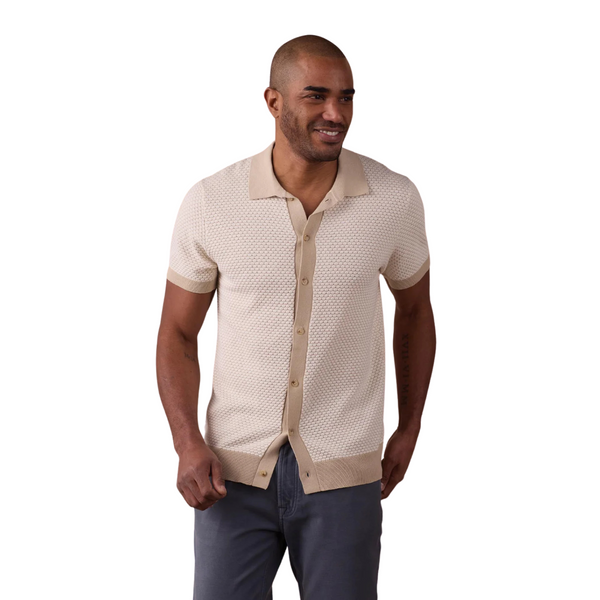 Front view of The Normal Brand Robles Knit Jacquard Button-Up in Ivory/Khaki featuring a geometric jacquard pattern, button front closure, and relaxed fit