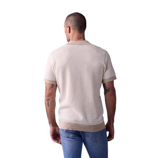 Back view of The Normal Brand Robles Polo in Ivory/Khaki with continued jacquard design and casual modern cut