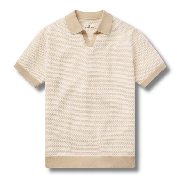 Flat lay of The Normal Brand Robles Knit Jacquard Polo in Ivory/Khaki showing the classic polo collar, knit texture, and button placket