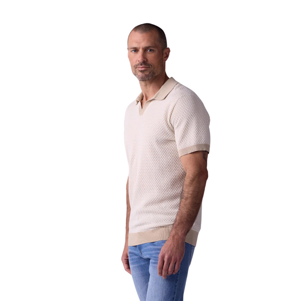 Side view of Robles Knit Jacquard Polo in Ivory and Khaki showing short sleeves, subtle contrast trim, and breathable knit construction