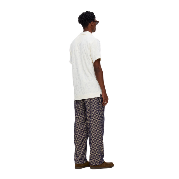 Back view of OAS Polo Terry Shirt in Summit highlighting clean lines, soft drape, and minimal detailing