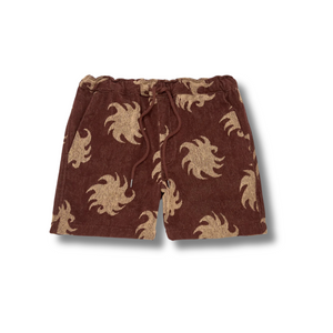 Flat lay of OAS Terry Shorts in Mocha Ember showcasing two-tone terry fabric, drawstring waistband, and clean hemline