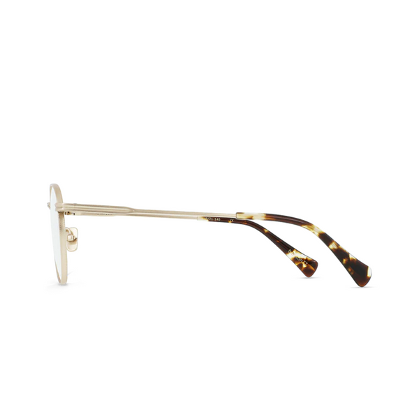 Flat lay of Raen Benson II eyeglasses in satin Japanese gold with brindle tortoise arms and clear lenses