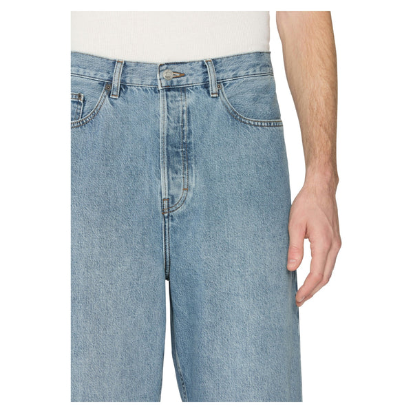 Close-up of dark denim weave, waistband, and stitching detail on the Frame Relaxed Jean in Jefferson