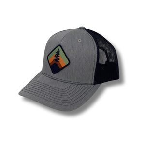 Front view of Local Stated Retro Pine Hat in Heather Grey and Navy featuring a vintage-style pine tree patch on a structured grey crown with a navy brim