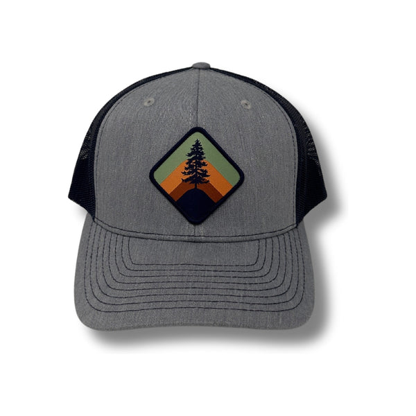 Front view of Local Stated Retro Pine Hat in Heather Grey and Navy featuring a vintage-style pine tree patch on a structured grey crown with a navy brim
