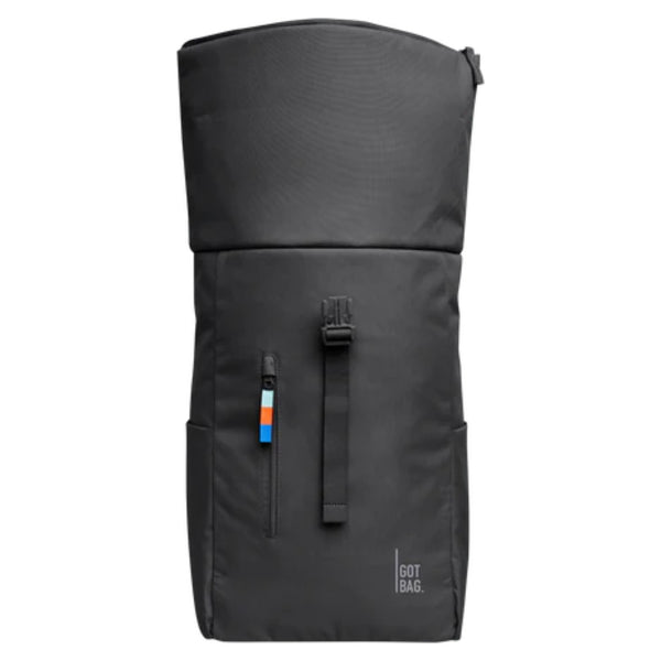 Close-up of roll-top closure and GOT BAG logo patch on the Shark-colored backpack