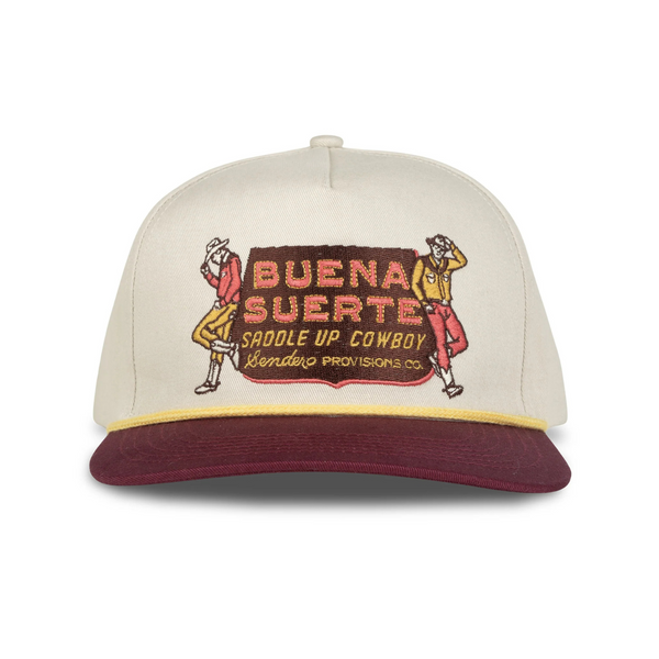 Front view of Sendero Buena Suerte Hat in cream and maroon featuring a structured crown, curved brim, and embroidered “Buena Suerte” patch