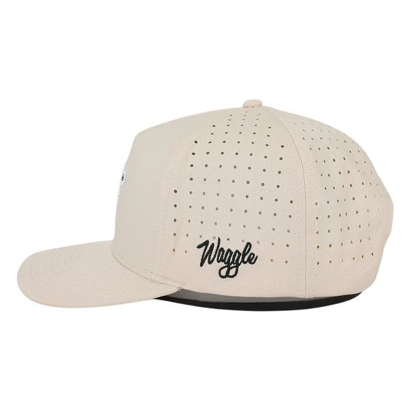 Side view of Waggle Snapper Hat showing breathable mesh side panels, mid-profile fit, and athletic performance styling