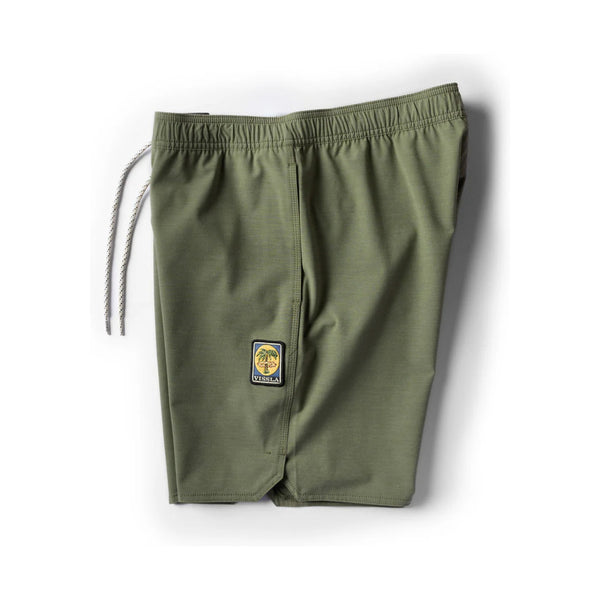 Side view of Vissla Solid Sets Ecolastic Boardshort in Surplus showing clean side seam, functional pocket, and lightweight comfort