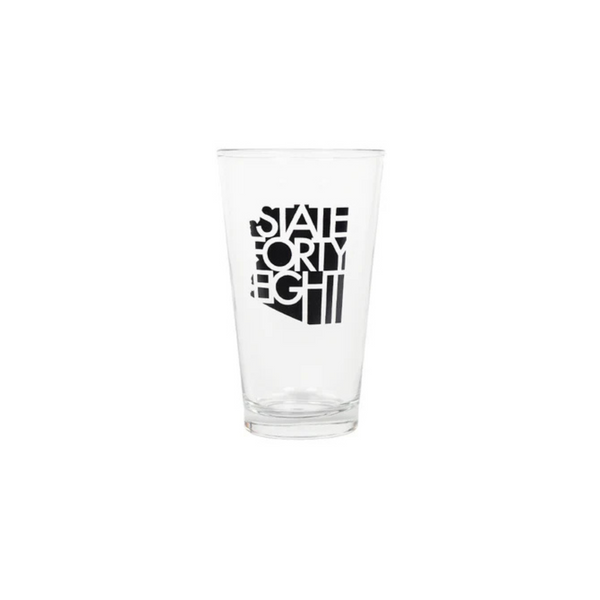 Front view of State Forty Eight Pint Glass in clear glass with black classic State Forty Eight logo printed on the front