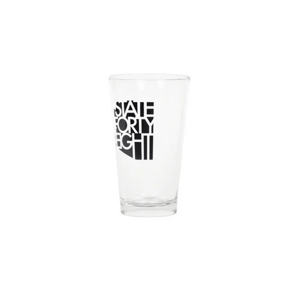 Side view of State Forty Eight Classic Pint Glass in black showing cylindrical shape and printed logo