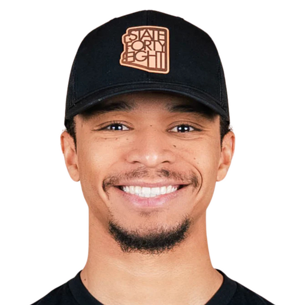 Front view of State Forty Eight Snapback Hat Classic in Black & Brown featuring the classic embroidered logo on a structured black crown with a brown brim