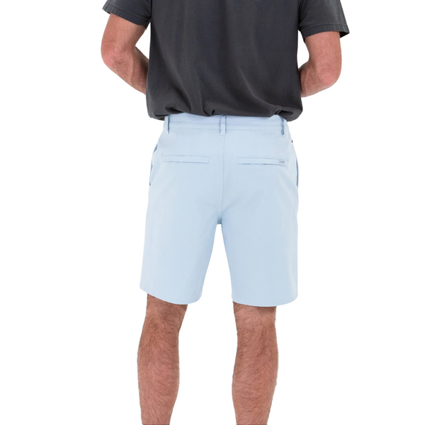 Back view of Tenore Bedford Chino Short in Light Blue with welt back pockets and a subtle logo tag