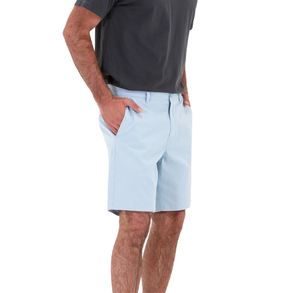 Side view of Tenore Bedford Chino Short in Light Blue showing a modern silhouette, soft cotton fabric, and functional side pockets