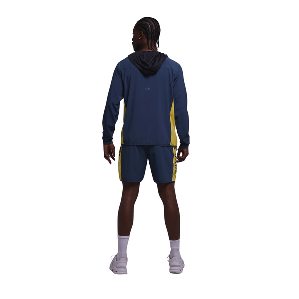 Back view of Tenore Flow Team Short in navy with minimal seam lines and a clean, comfortable fit