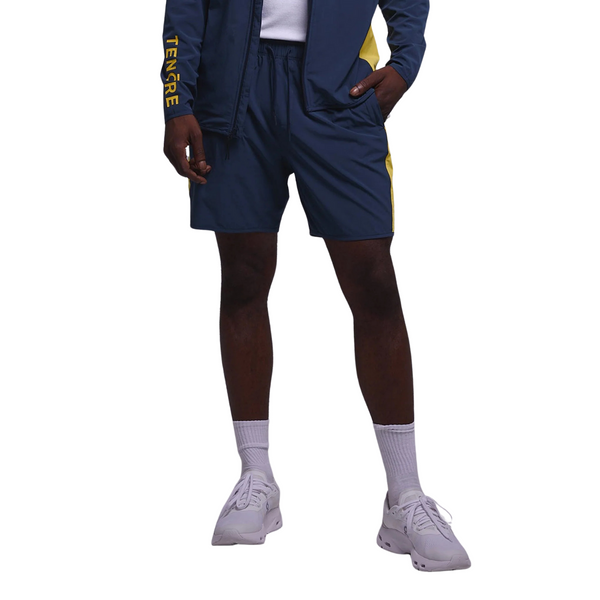 Close-up of waistband stitching and performance fabric texture on the Tenore Flow Team Short in navy