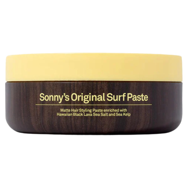 Side view of Sun Bum Texturizing Surf Paste jar showing product label and matte finish design