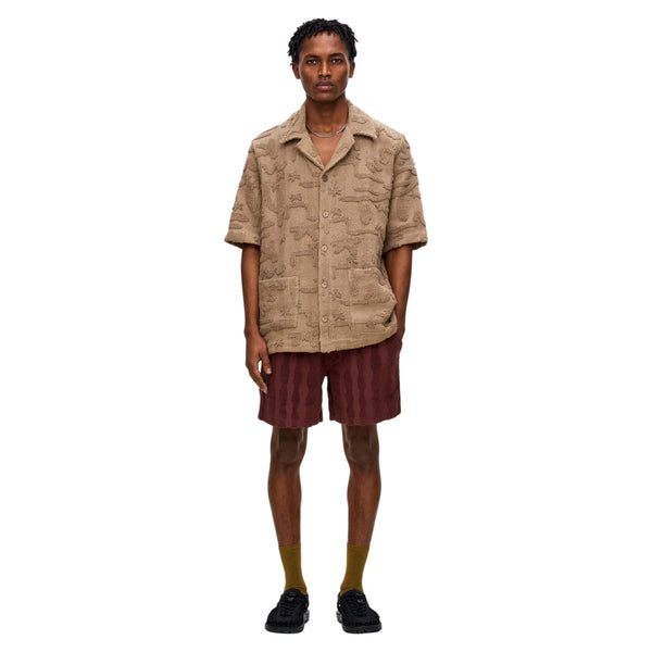 Front view of the OAS Cleo Varadero Shirt featuring a relaxed fit, short sleeves, and abstract tropical-inspired print