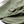Close-up of surplus green eco-stretch fabric, waistband stitching, and pocket design on the Vissla Ecolastic Boardshort