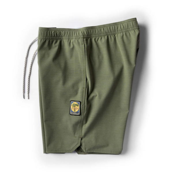 Side view of Vissla Solid Sets Ecolastic Boardshort in Surplus showing clean side seam, functional pocket, and lightweight comfort
