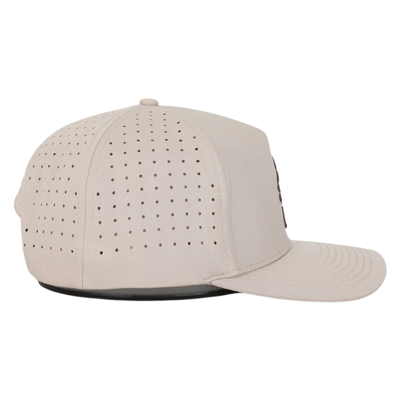 Side view of Waggle Wally Hat in Tan showing breathable mesh side panels, performance fit, and mid-profile shape